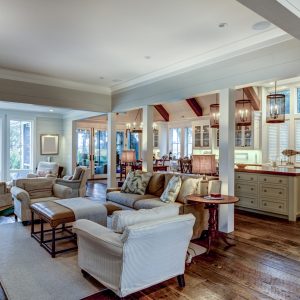 Large open concept home interior with living room, kitchen, and dining room.